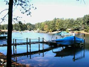 497 Kemp Road Mooresville, NC 28117 - Photo 2 of 8 a view of a lake from a balcony