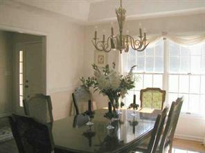 497 Kemp Road Mooresville, NC 28117 - Photo 7 of 8 a dining room with furniture and wooden floor