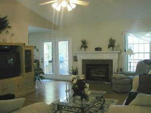 497 Kemp Road Mooresville, NC 28117 - Photo 8 of 8 a living room with furniture and a fireplace