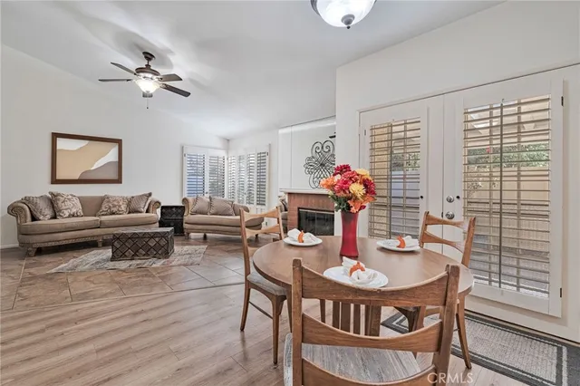 a kitchen with stainless steel appliances a sink stove and window