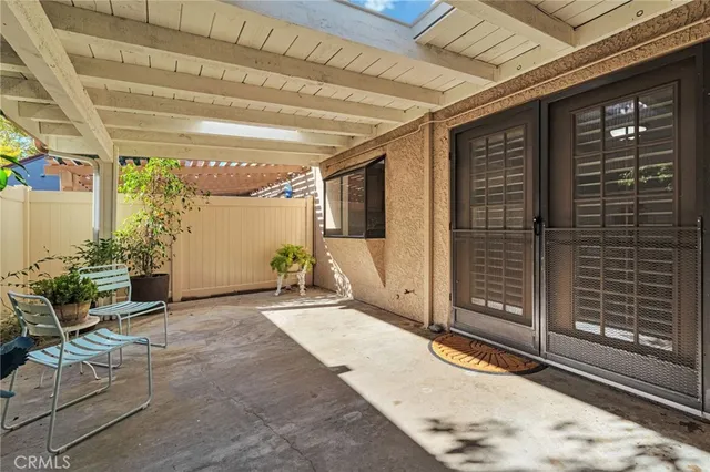 a view of a porch with seating space