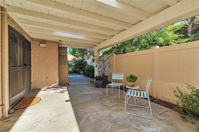 an aerial view of a house with a yard pool seating area and yard