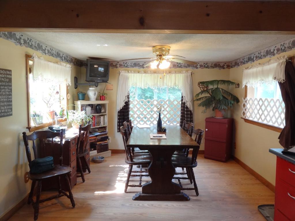133 Turner Howe Road Milo, ME 04463 - Photo 2 of 28 dining room addition filled with...