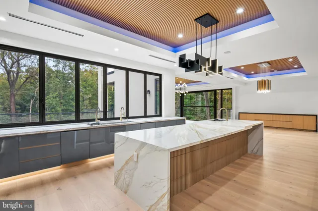 a kitchen with a stove and a sink