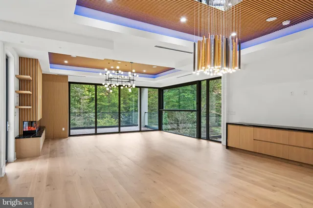 a view of a living room with a large window