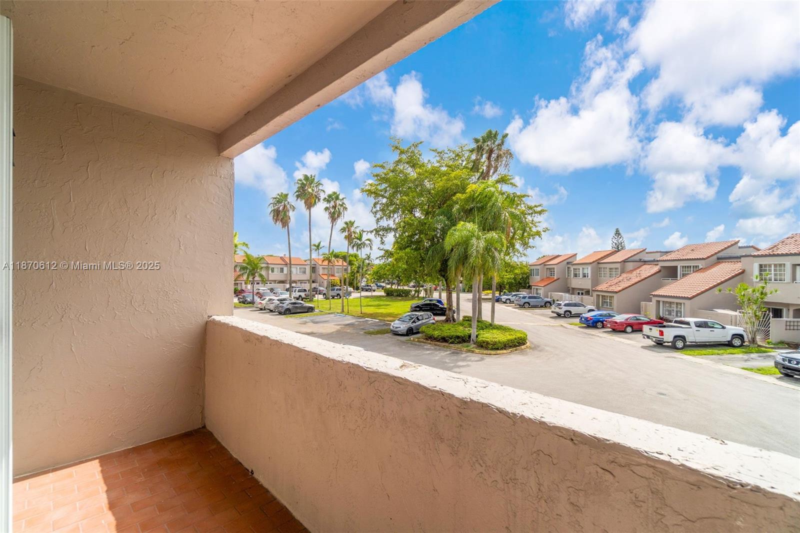 6514 Southwest 128th Place, Unit 6514 Miami, FL 33183 - Photo 27 of 46 a view of car parked