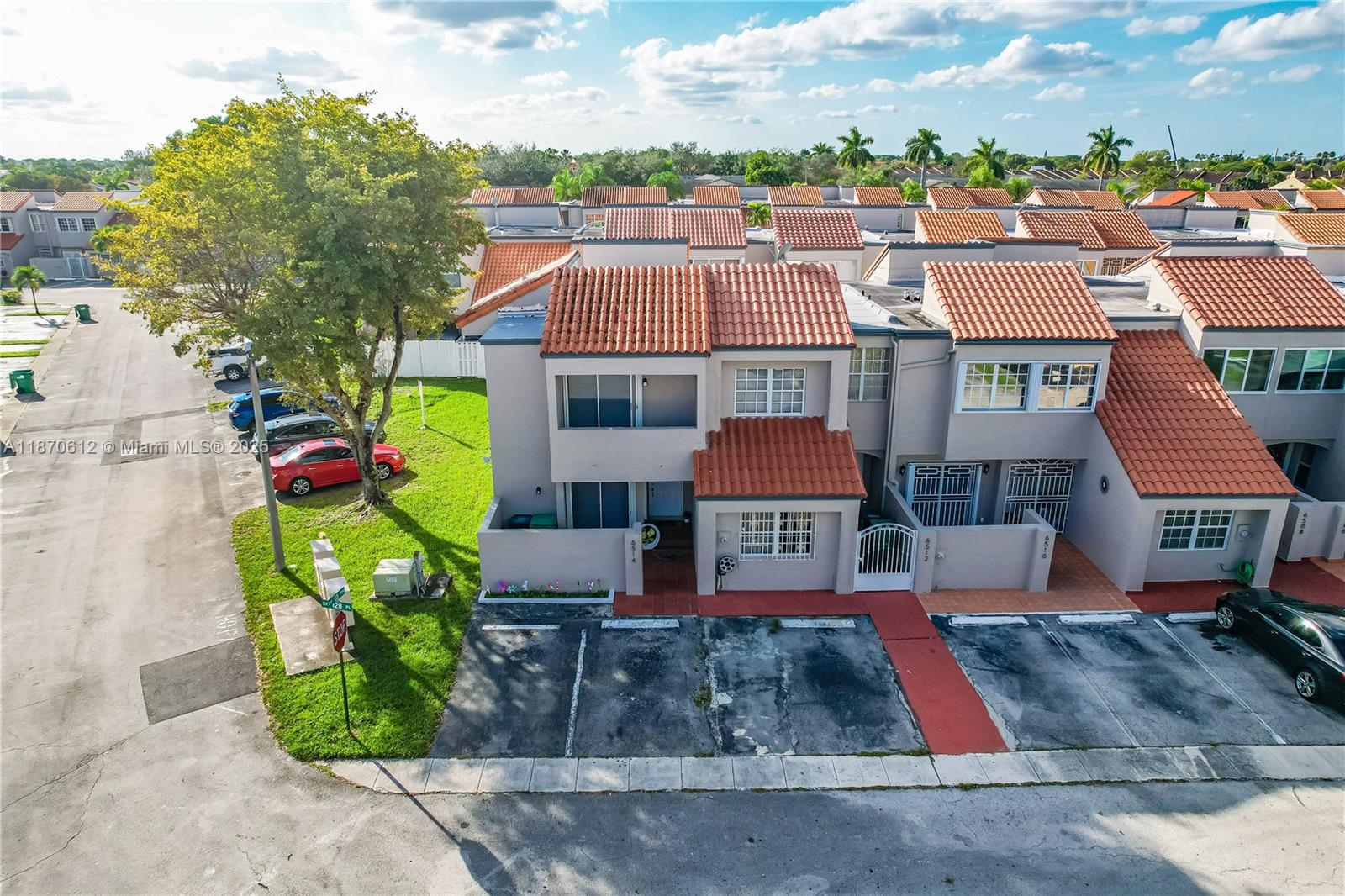6514 Southwest 128th Place, Unit 6514 Miami, FL 33183 - Photo 40 of 46 an aerial view of residential houses