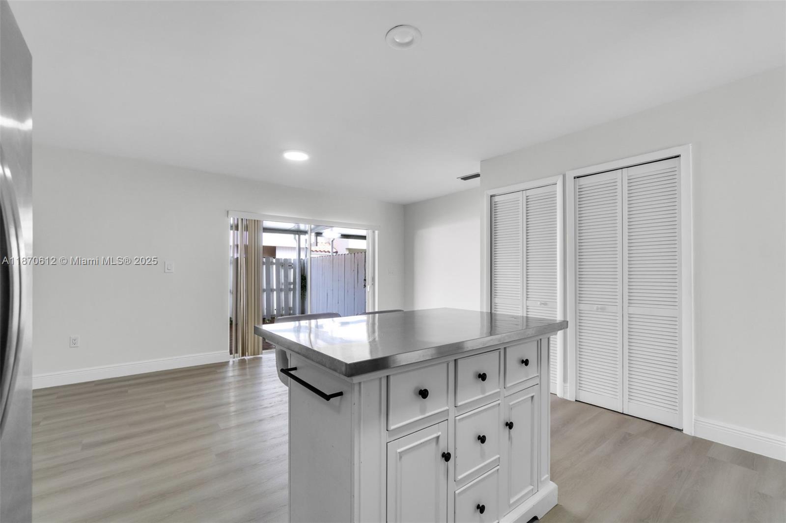 6514 Southwest 128th Place, Unit 6514 Miami, FL 33183 - Photo 9 of 46 a kitchen with granite countertop a sink and a stove