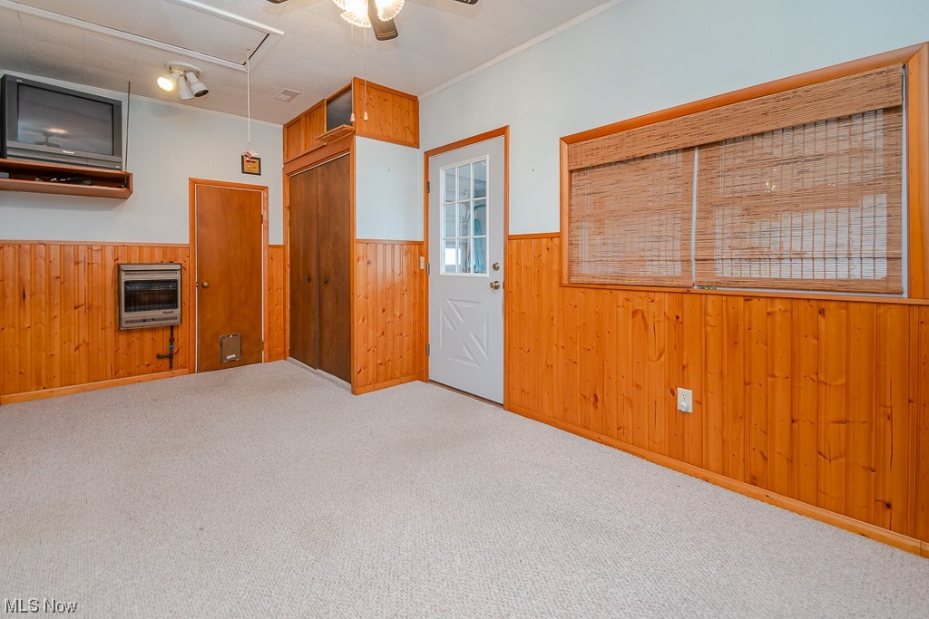 5 Pleasantview Vermilion, OH 44089 - Photo 12 of 37 Unfurnished bedroom featuring light carpet and ceiling fan
