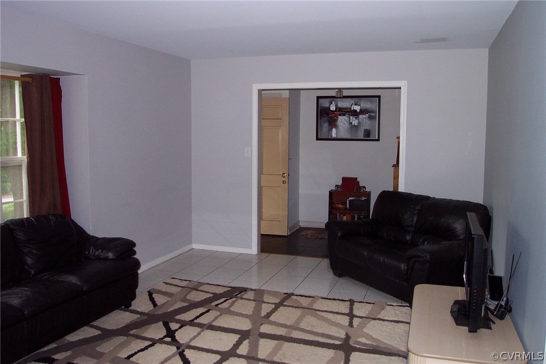 3901 Cedar Grove Road Richmond, VA 23235 - Photo 3 of 31 a living room with furniture and a window