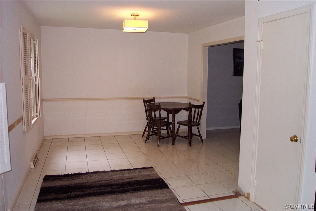 3901 Cedar Grove Road Richmond, VA 23235 - Photo 8 of 31 an empty room with wooden floor and furniture