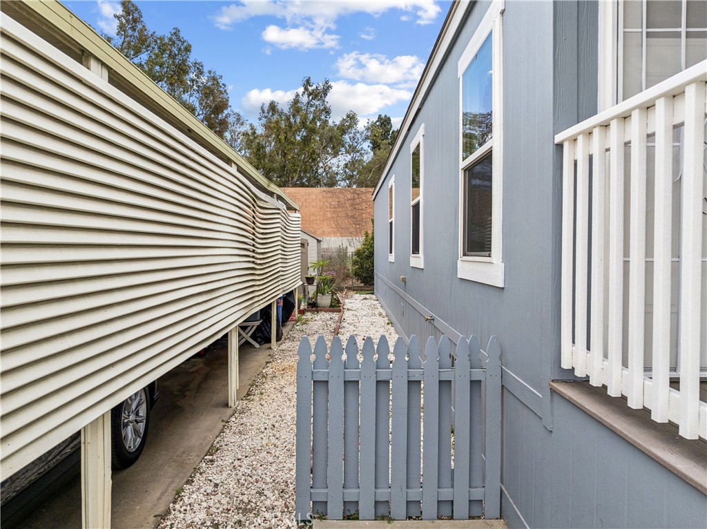 10550 Dunlap Crossing Road, Unit 141 Whittier, CA 90606 - Photo 30 of 38 a view of a house with wooden deck