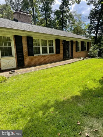 a view of a house with a garden