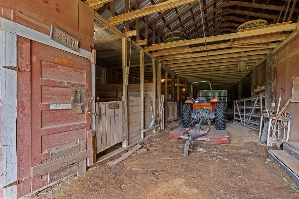 2900 Peel Road Springtown, TX 76082 - Photo 22 of 34 a view of a storage room with a lot of stuff