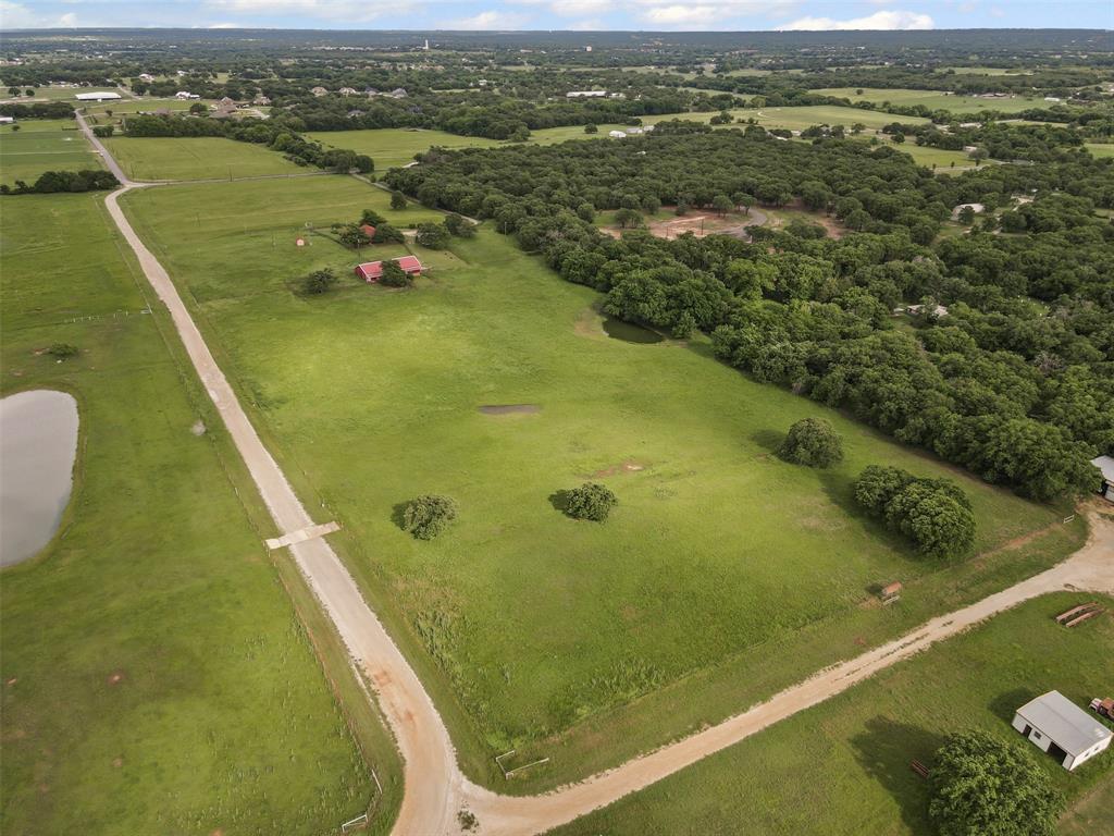 2900 Peel Road Springtown, TX 76082 - Photo 29 of 34 a view of a lake from a balcony