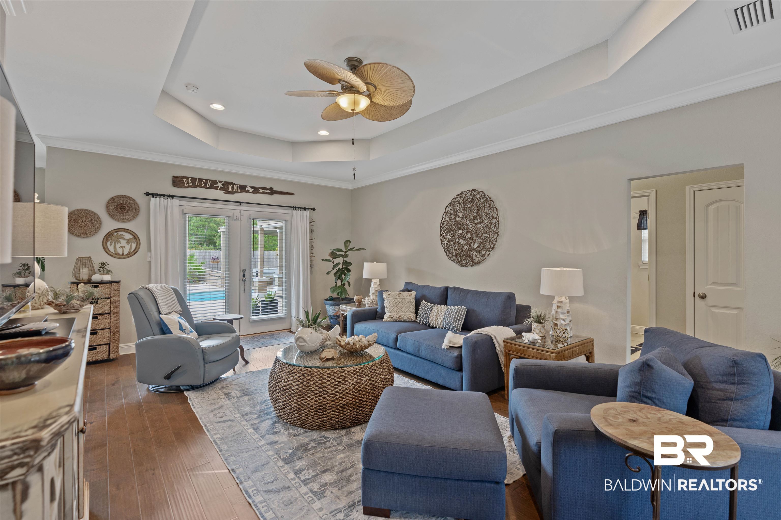 3168 Bellingrath Drive Foley, AL 36535 - Photo 5 of 36 Living room with french doors, ceiling fan, a tray ceiling, dark hardwood / wood-style floors, and ornamental molding