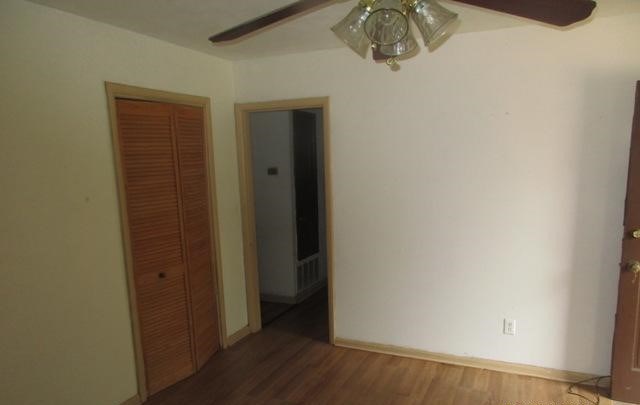 4523 Moline Avenue Columbus, GA 31907 - Photo 2 of 5 a view of a hallway with wooden floor
