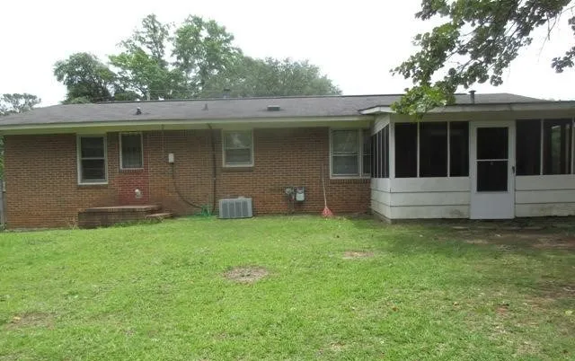 a view of a house with a garden