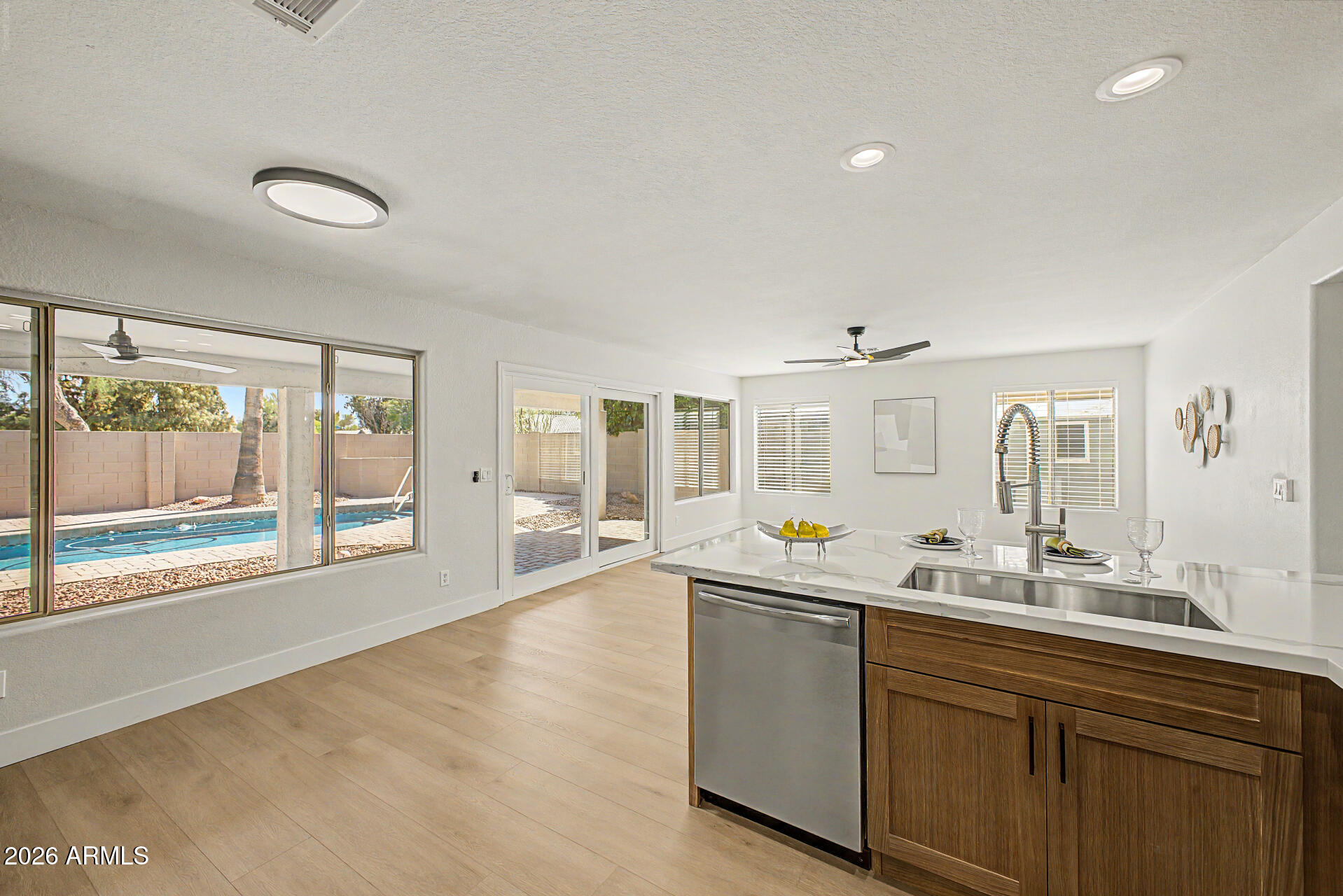 1743 East Redfield Road Gilbert, AZ 85234 - Photo 12 of 30 a large bathroom with a large mirror vanity and a sink