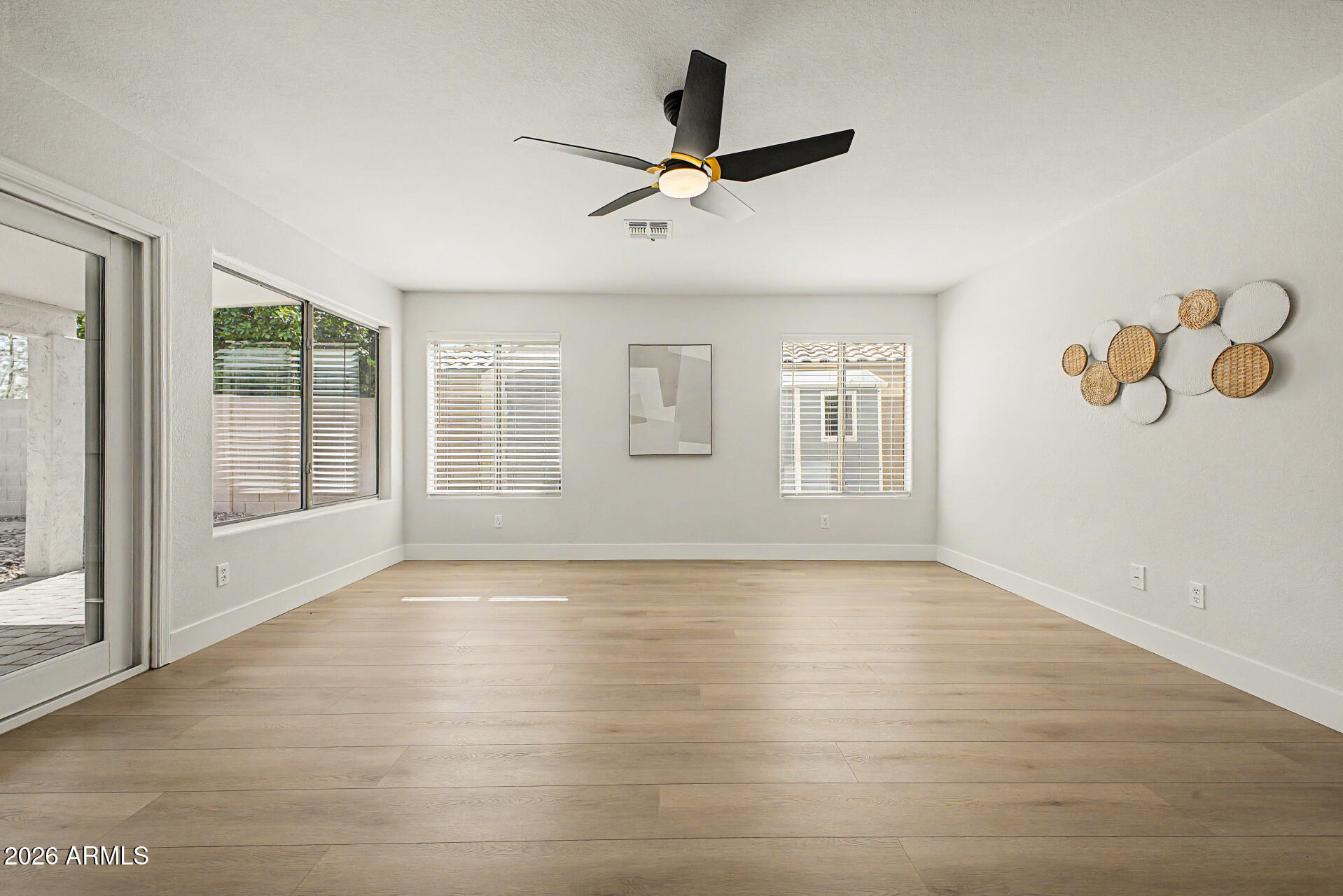1743 East Redfield Road Gilbert, AZ 85234 - Photo 14 of 30 a view of an empty room with glass door
