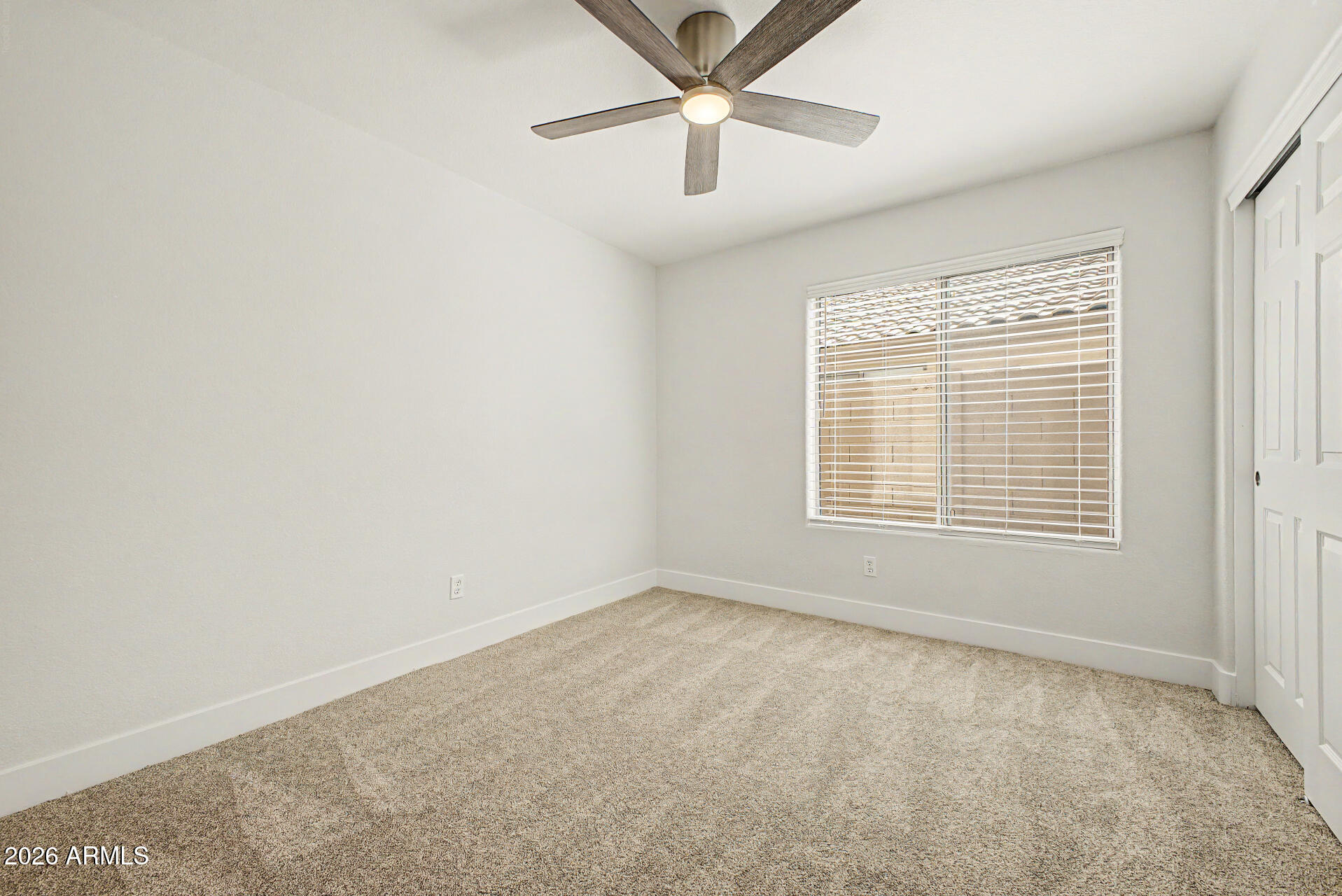 1743 East Redfield Road Gilbert, AZ 85234 - Photo 16 of 30 a view of an empty room with a window
