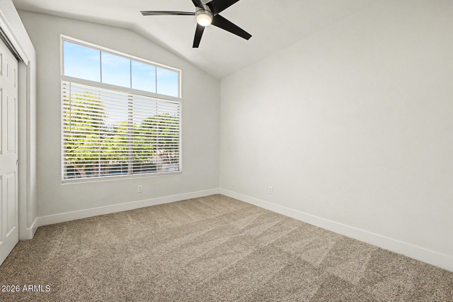 1743 East Redfield Road Gilbert, AZ 85234 - Photo 23 of 30 a view of an empty room with a window