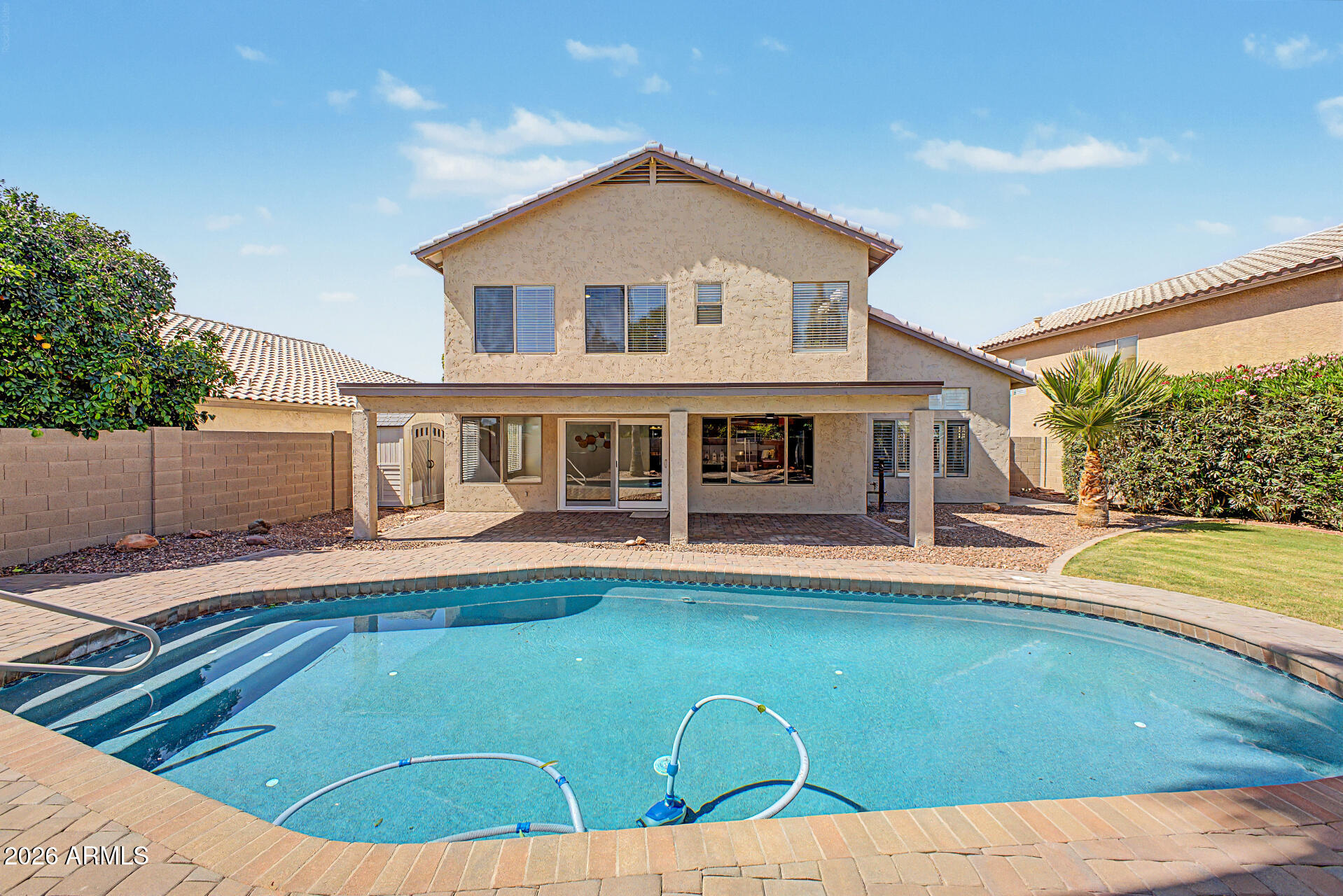 1743 East Redfield Road Gilbert, AZ 85234 - Photo 28 of 30 a view of a house with pool and a yard