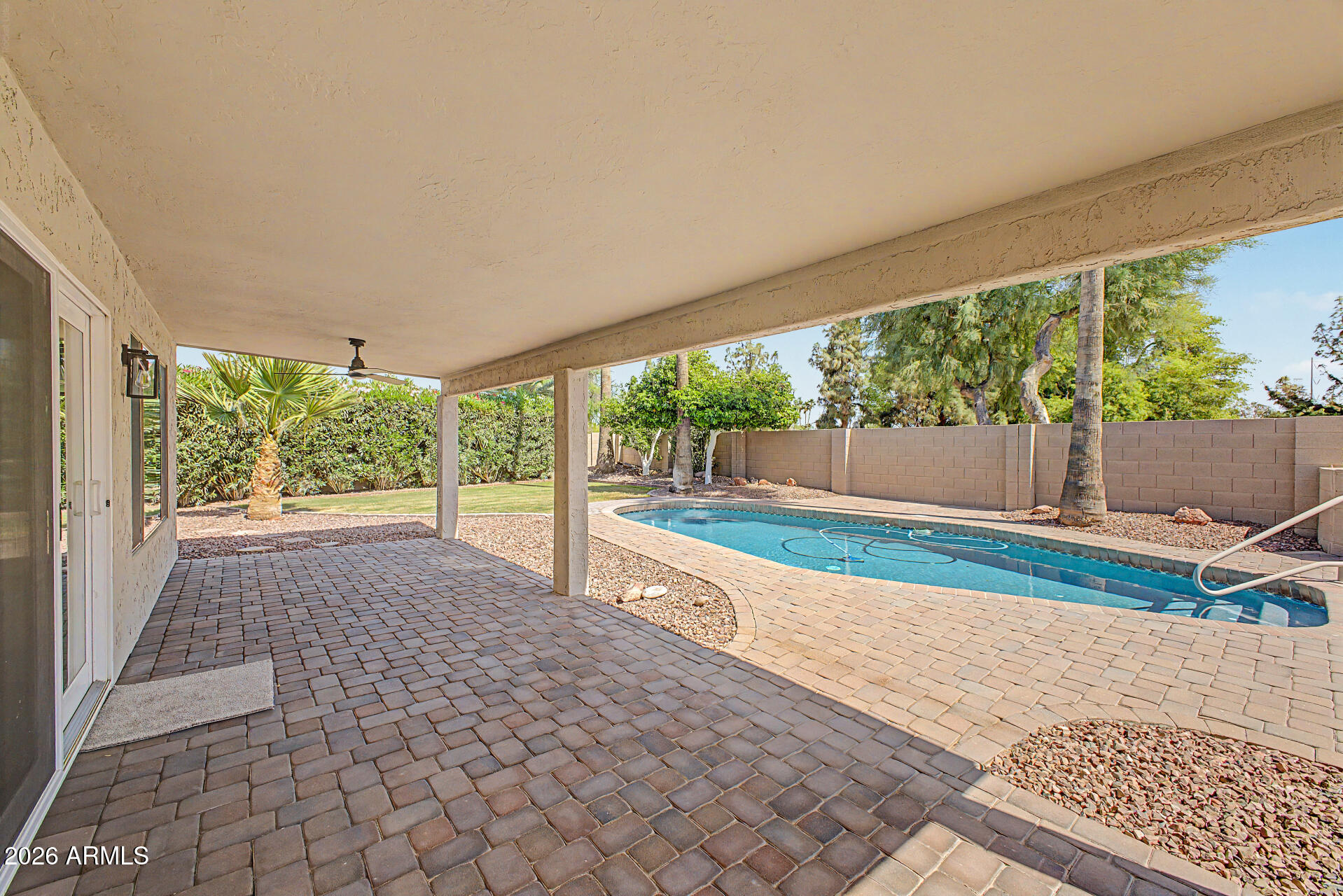 1743 East Redfield Road Gilbert, AZ 85234 - Photo 29 of 30 a view of room with a large window and wooden fence