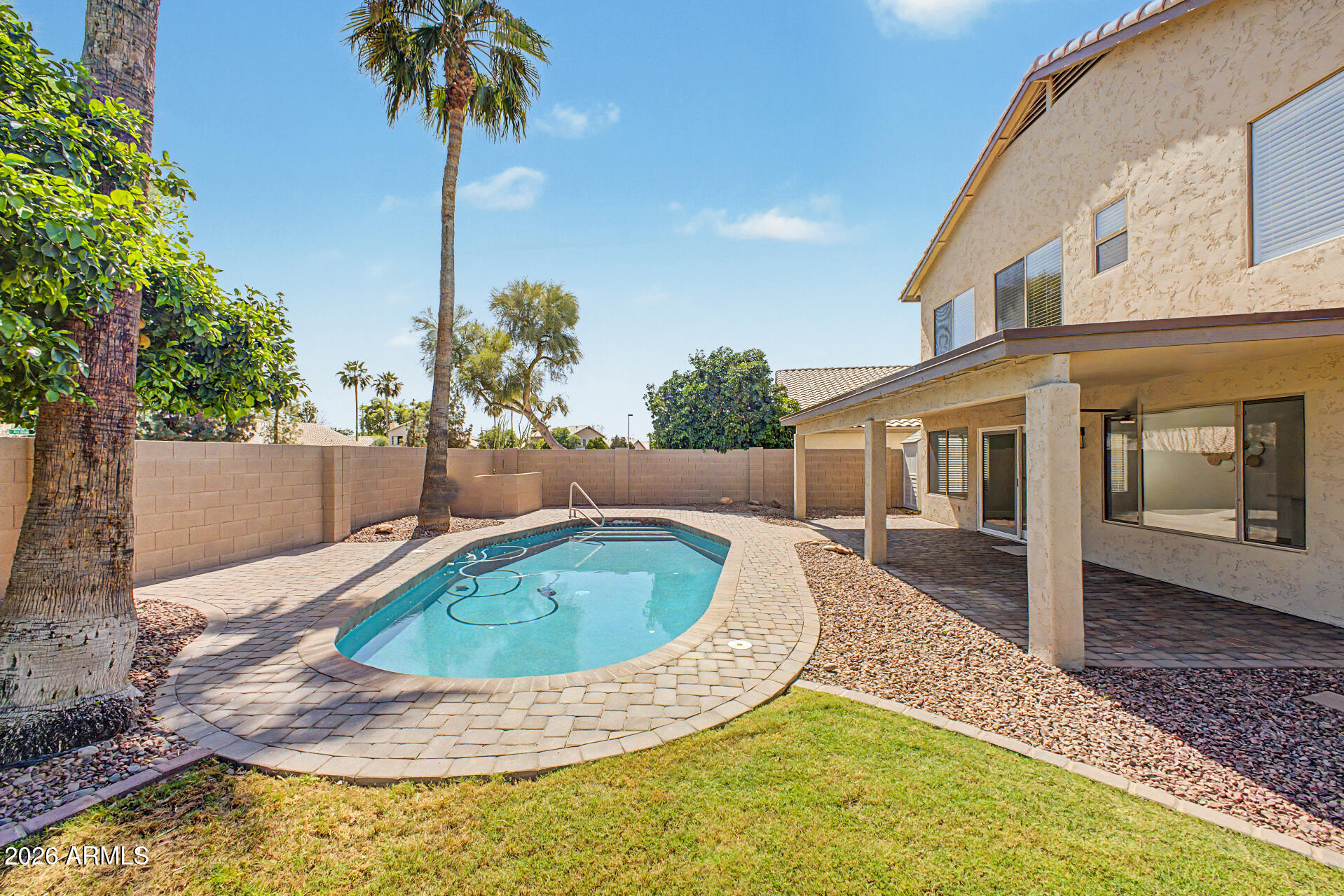 1743 East Redfield Road Gilbert, AZ 85234 - Photo 30 of 30 a view of a house with swimming pool