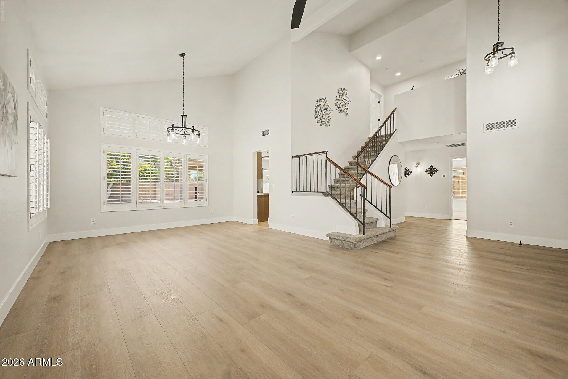 1743 East Redfield Road Gilbert, AZ 85234 - Photo 4 of 30 a view of empty room with wooden floor