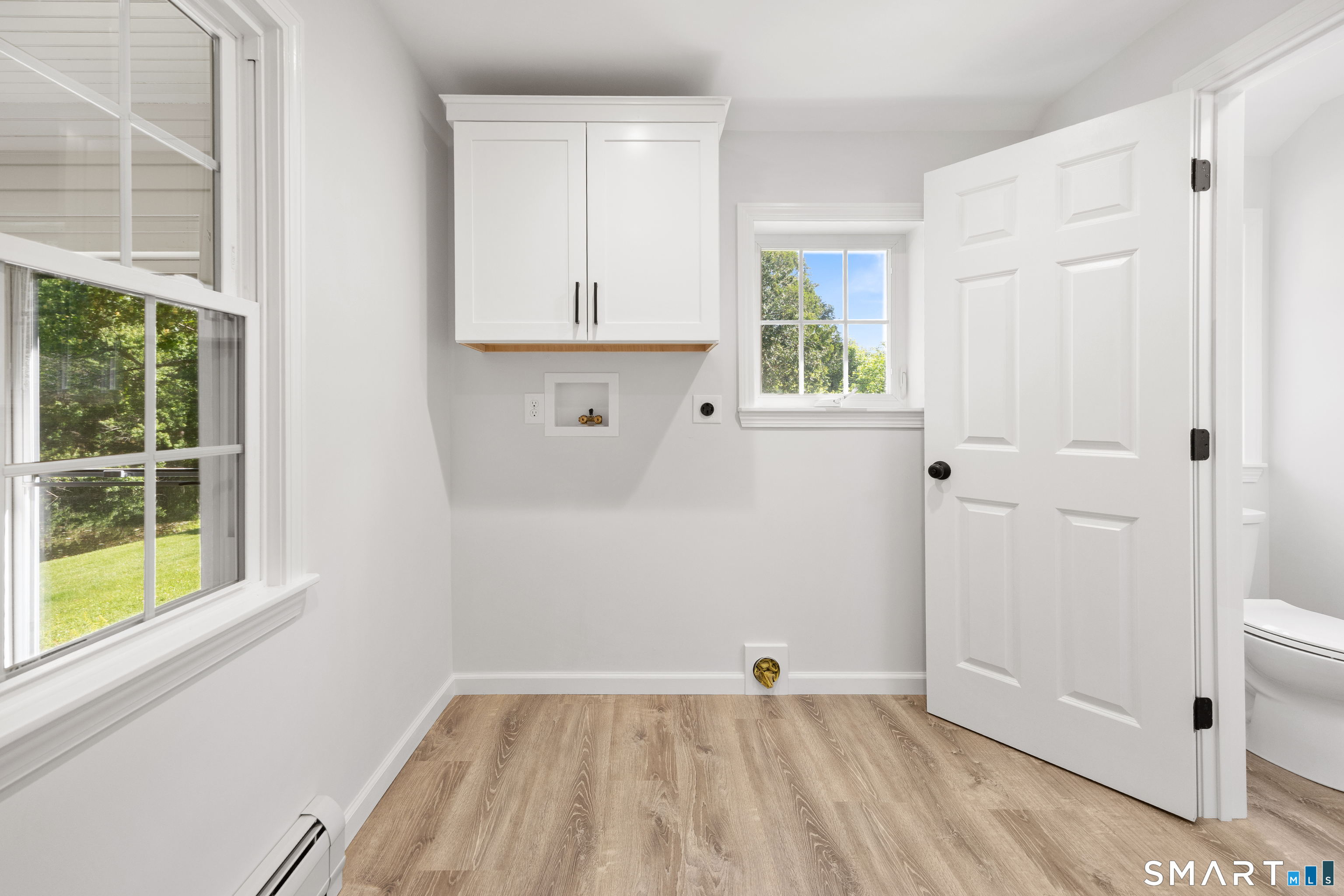 768 North Brooksvale Road Cheshire, CT 06410 - Photo 13 of 39 First Floor Laundry Room with 1/2 bath