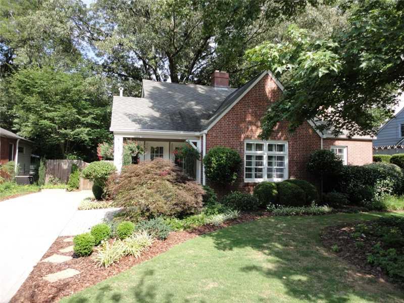 415 Ridgecrest Road Northeast Atlanta, GA 30307 - Photo 1 of 1 Facade/Exterior Front. Beautiful Druid Hills gem with incredible garden oasis!