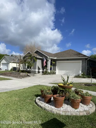 $385,000 | 5513 Oak Hollow Drive, Titusville, FL 32780