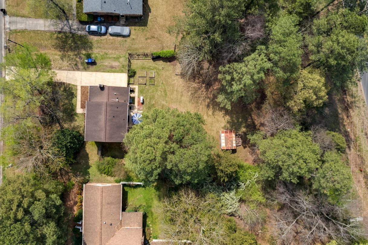 5614 Pelham Road Durham, NC 27713 - Photo 28 of 37 an aerial view of residential house with outdoor space and trees all around