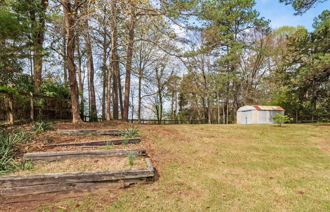 5614 Pelham Road Durham, NC 27713 - Photo 33 of 37 a view of open space with trees in the background