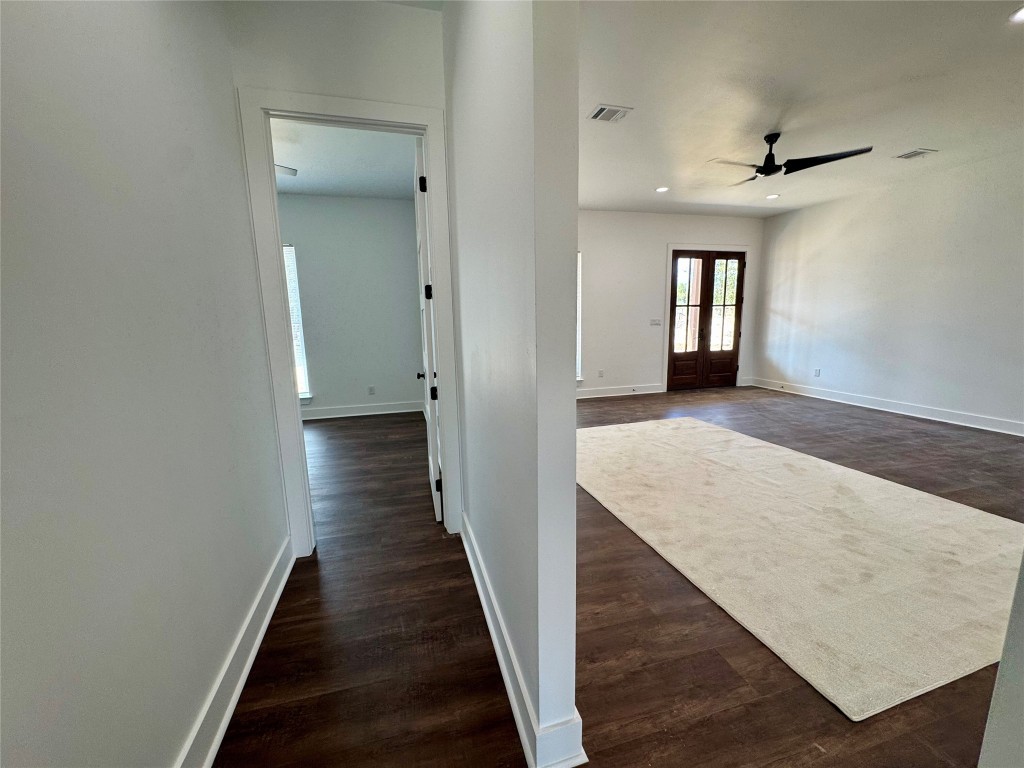 1353 Red Town Road, Unit B Elgin, TX 78621 - Photo 16 of 22 wooden floor in a hall with an entryway