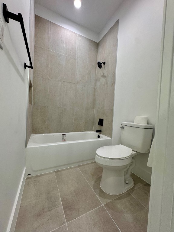 1353 Red Town Road, Unit B Elgin, TX 78621 - Photo 20 of 22 a bathroom with a toilet and a bath tub