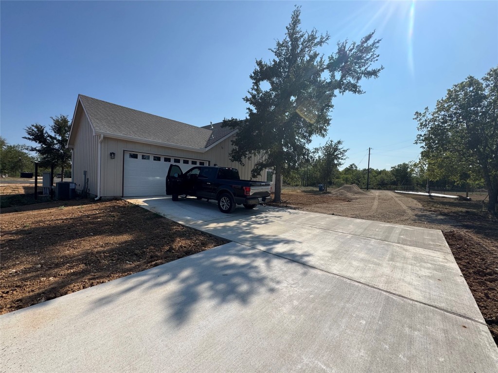 1353 Red Town Road, Unit B Elgin, TX 78621 - Photo 3 of 22 a view of a house with a yard