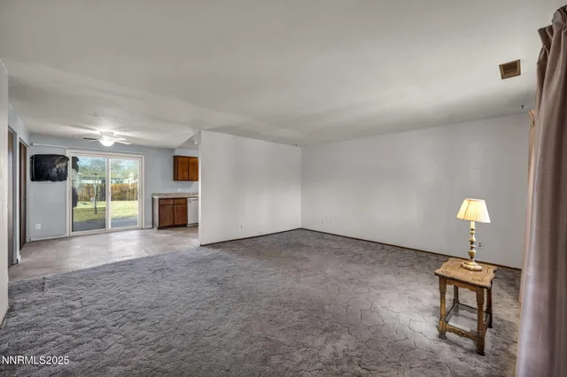 a kitchen with a stove a sink and a refrigerator