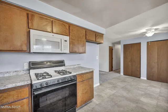 a view of a room with a large window