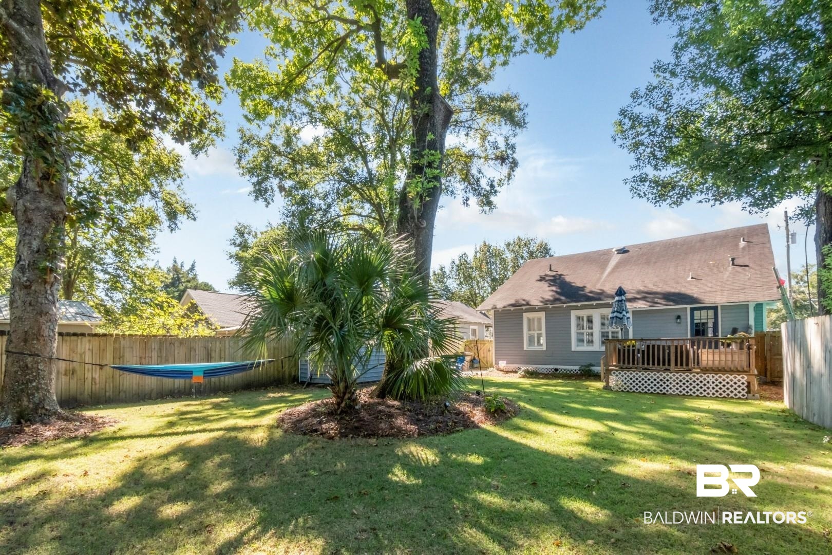 116 Item Avenue Mobile, AL 36607 - Photo 28 of 33 View of yard featuring a deck