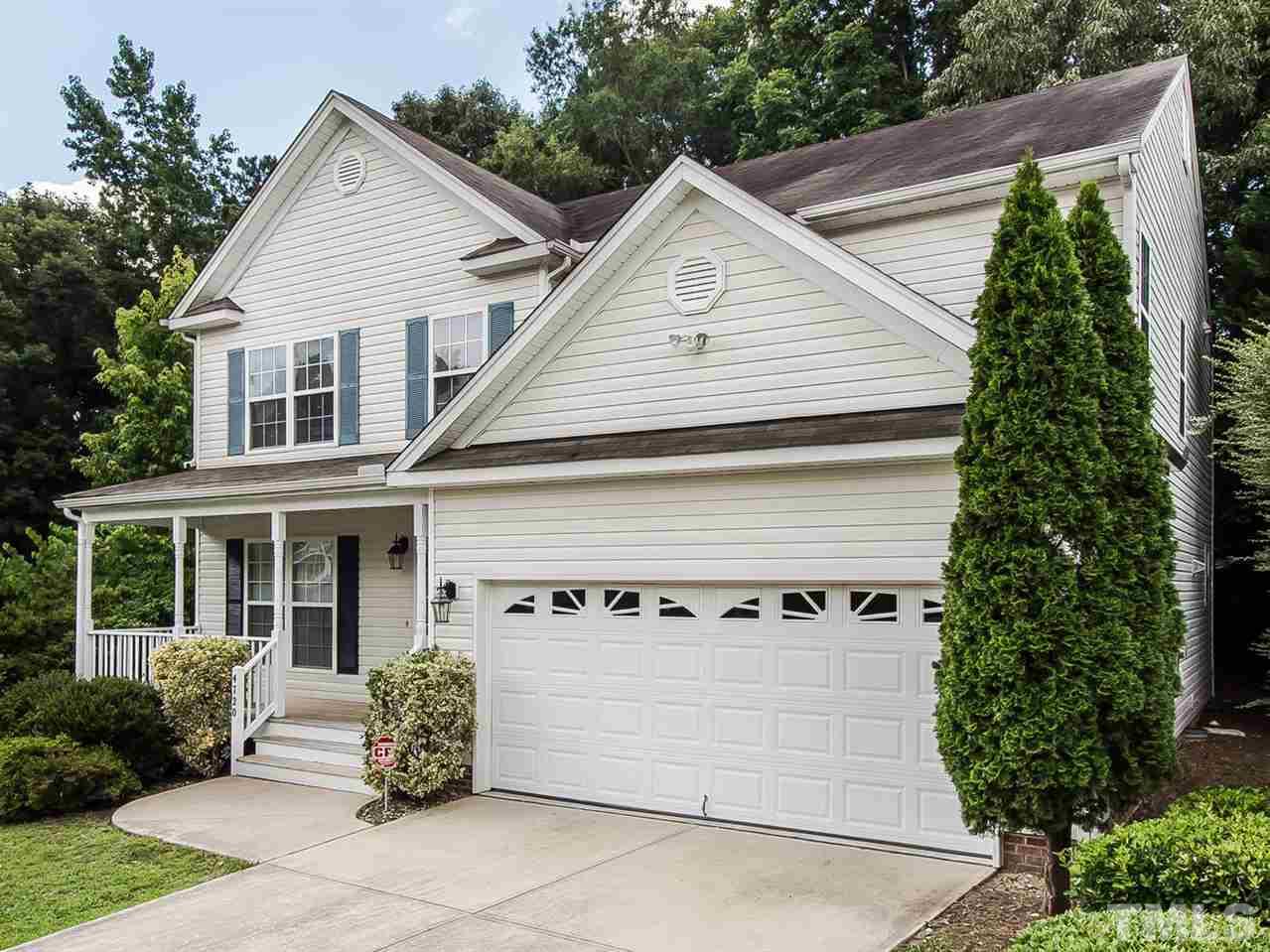4720 Drewbridge Way Raleigh, NC 27604 - Photo 2 of 21 a front view of a house with a garden