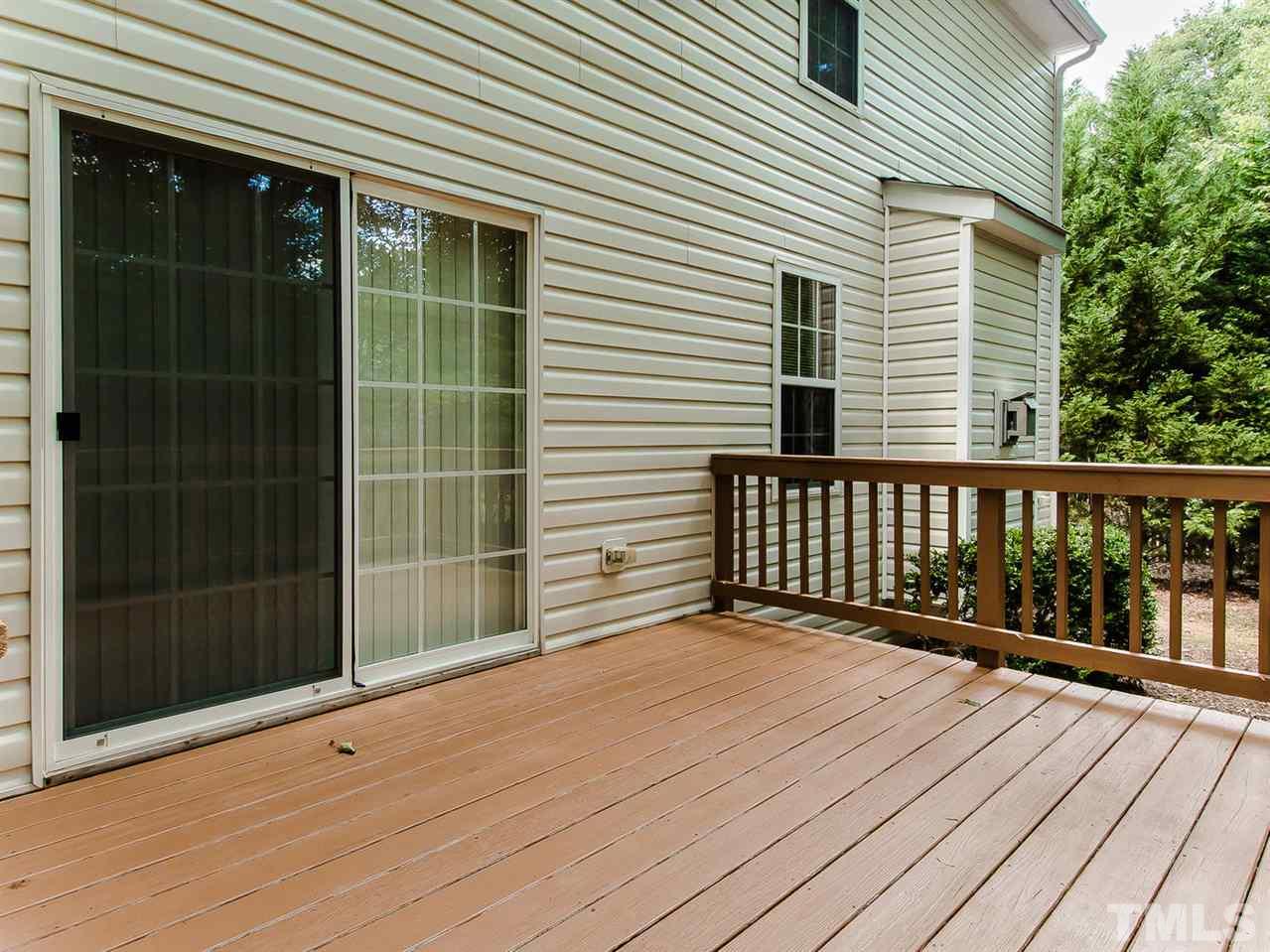 4720 Drewbridge Way Raleigh, NC 27604 - Photo 19 of 21 a view of a wooden deck