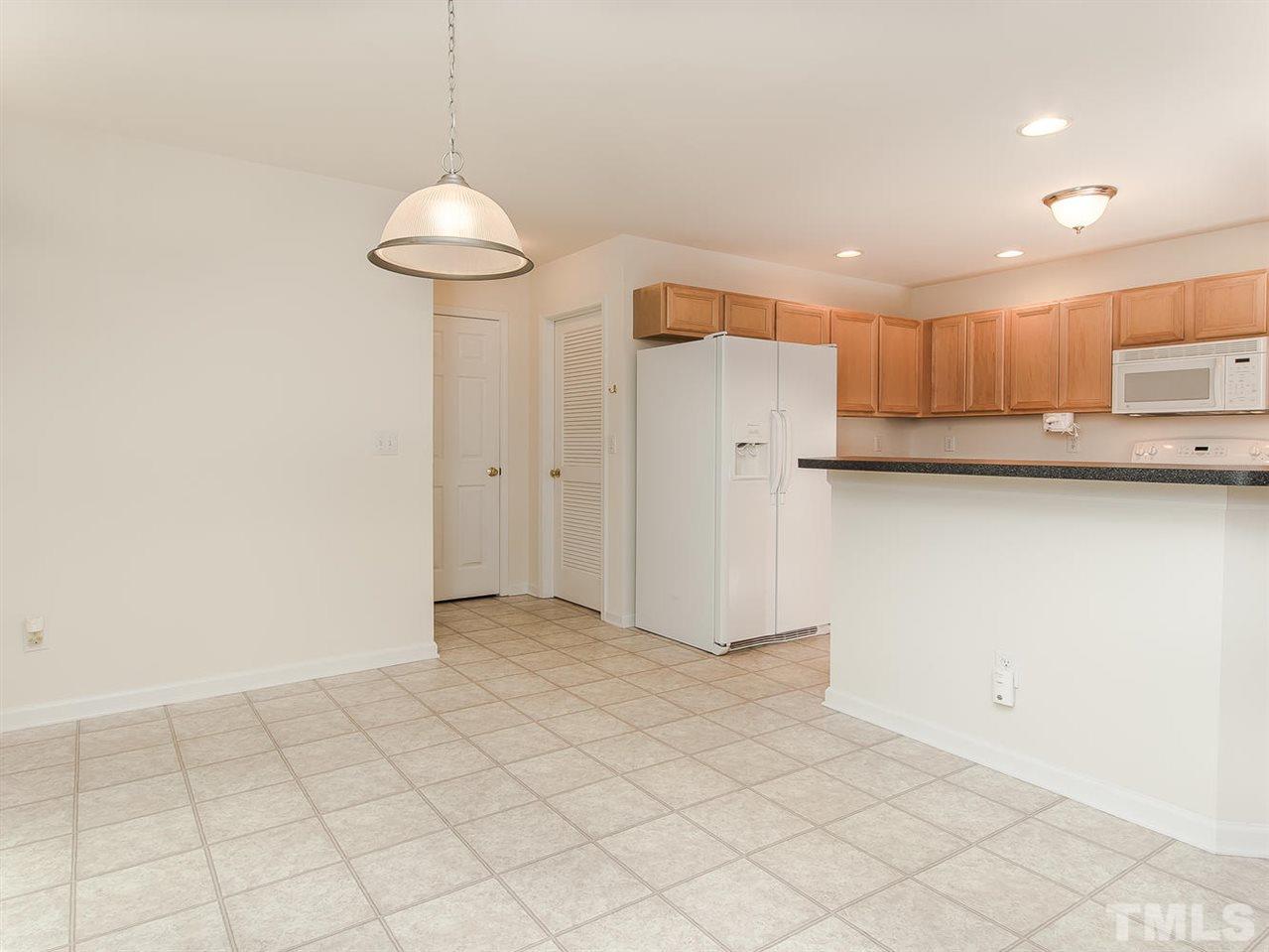 4720 Drewbridge Way Raleigh, NC 27604 - Photo 7 of 21 a view of a kitchen with a sink