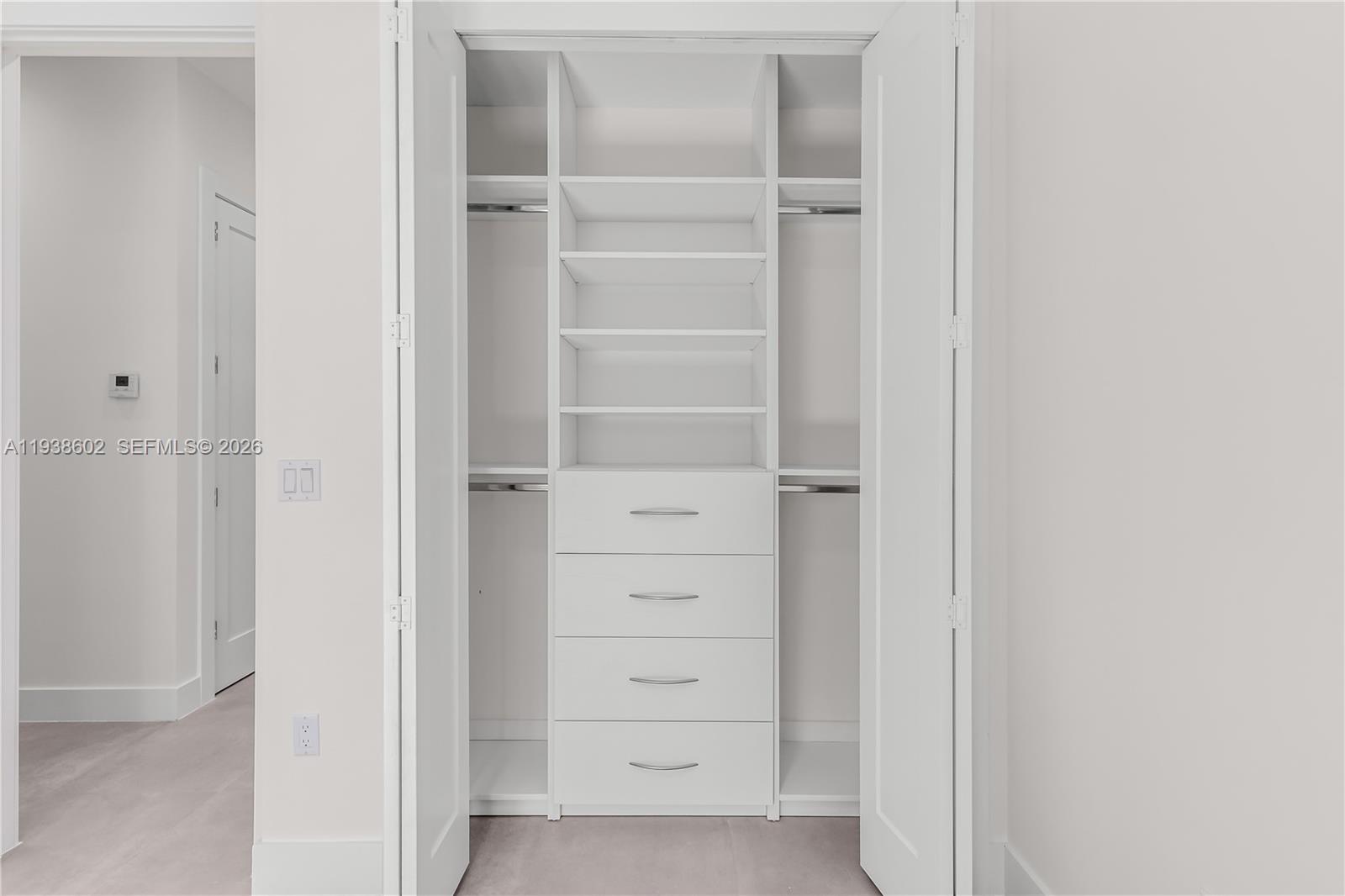 1030 Northeast 121st Street Biscayne Park, FL 33161 - Photo 27 of 47 a view of walk in closet