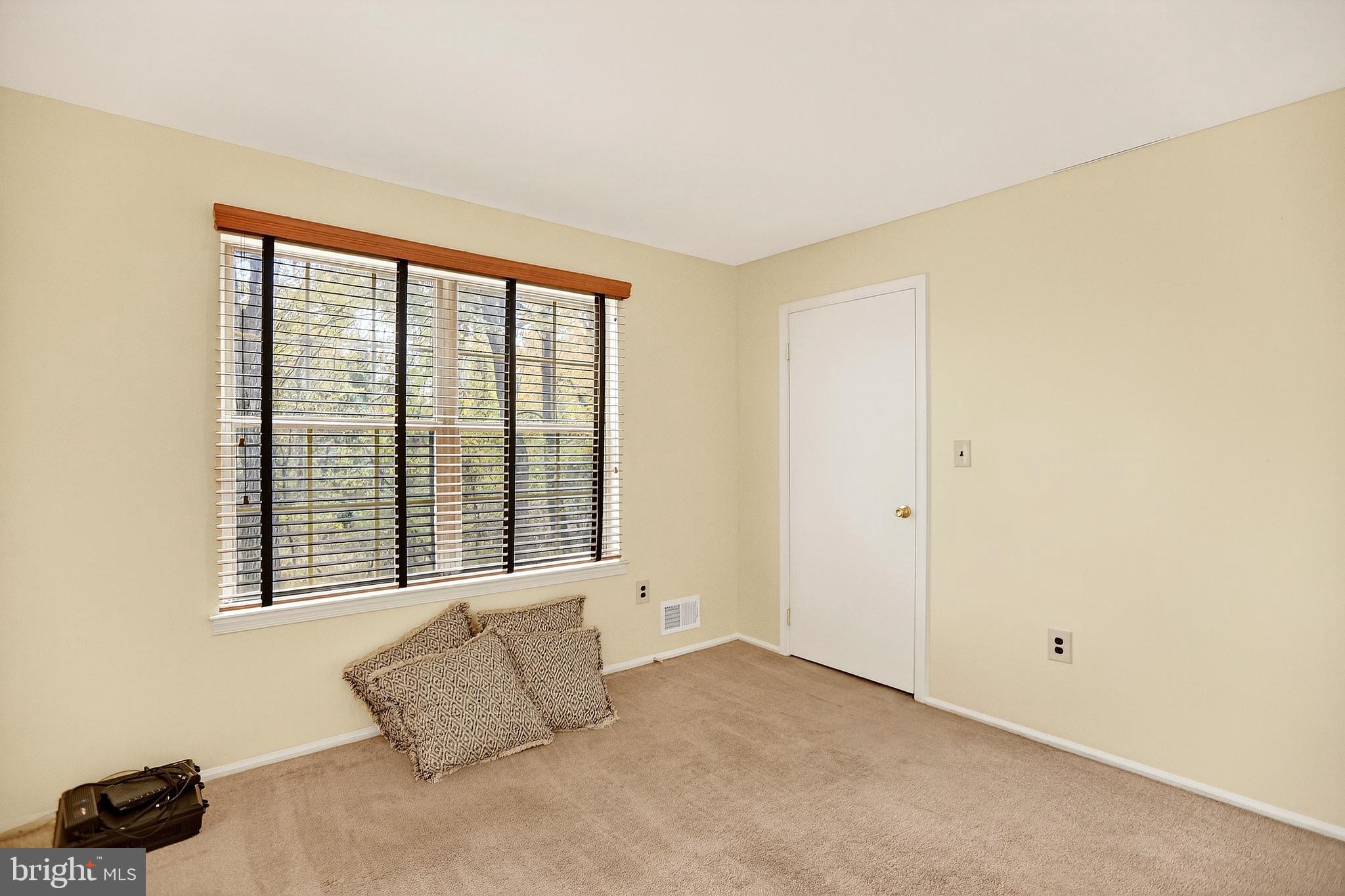 13 Azalea Court Lawrenceville, NJ 08648 - Photo 16 of 27 a bedroom with a bed and a window