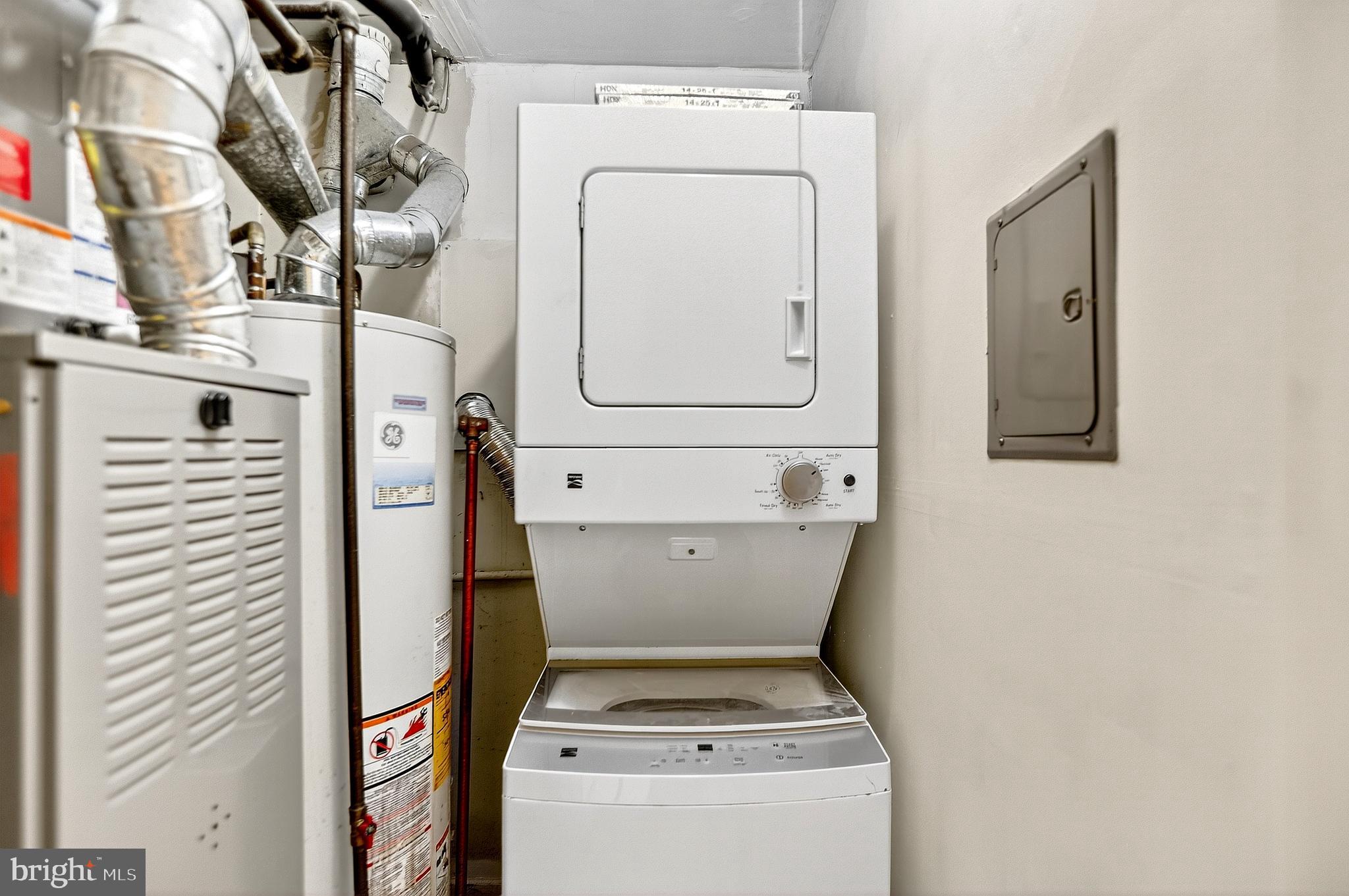 13 Azalea Court Lawrenceville, NJ 08648 - Photo 19 of 27 a utility room with dryer and washer