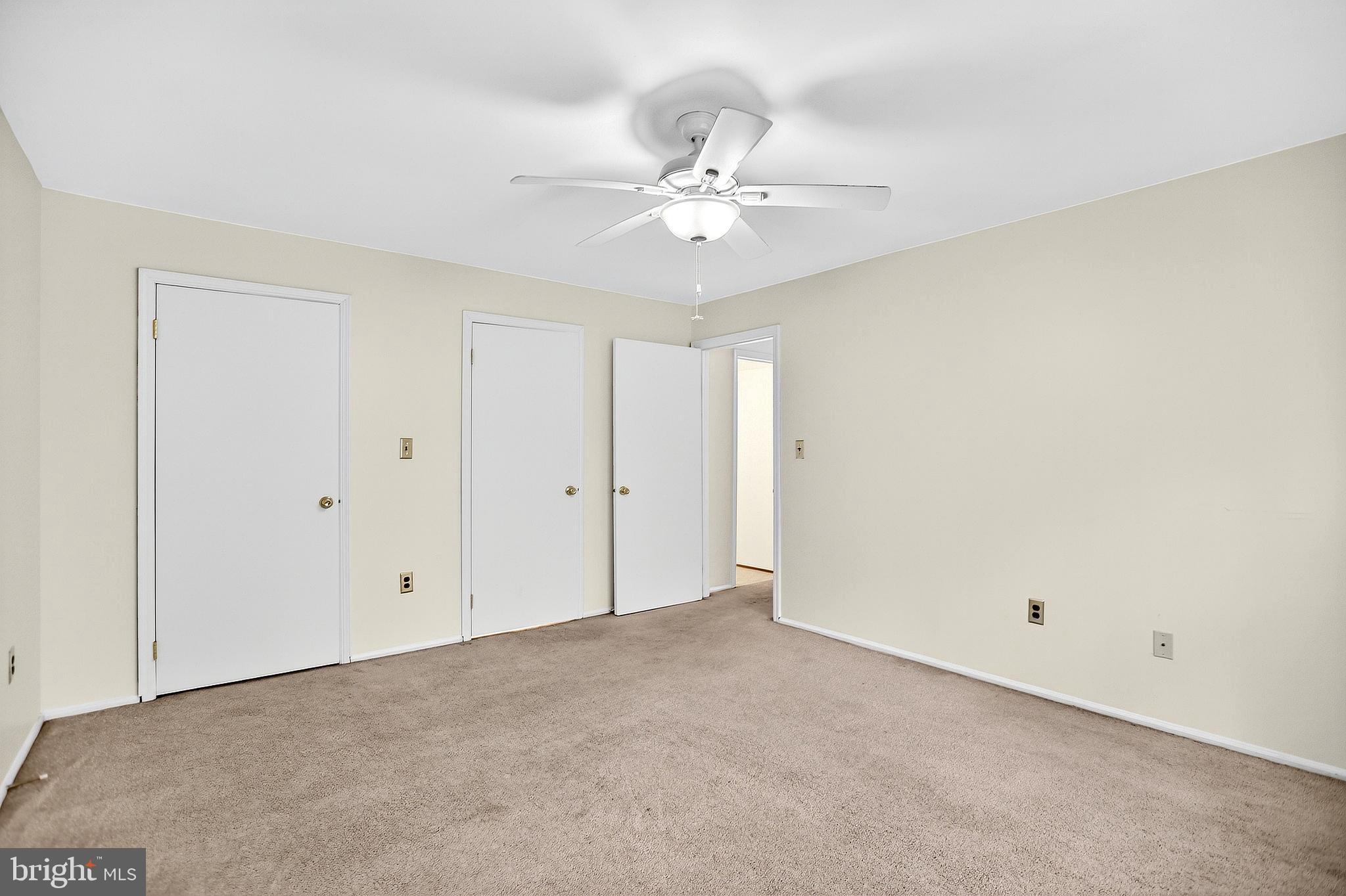 13 Azalea Court Lawrenceville, NJ 08648 - Photo 23 of 27 a view of an empty room with a fan