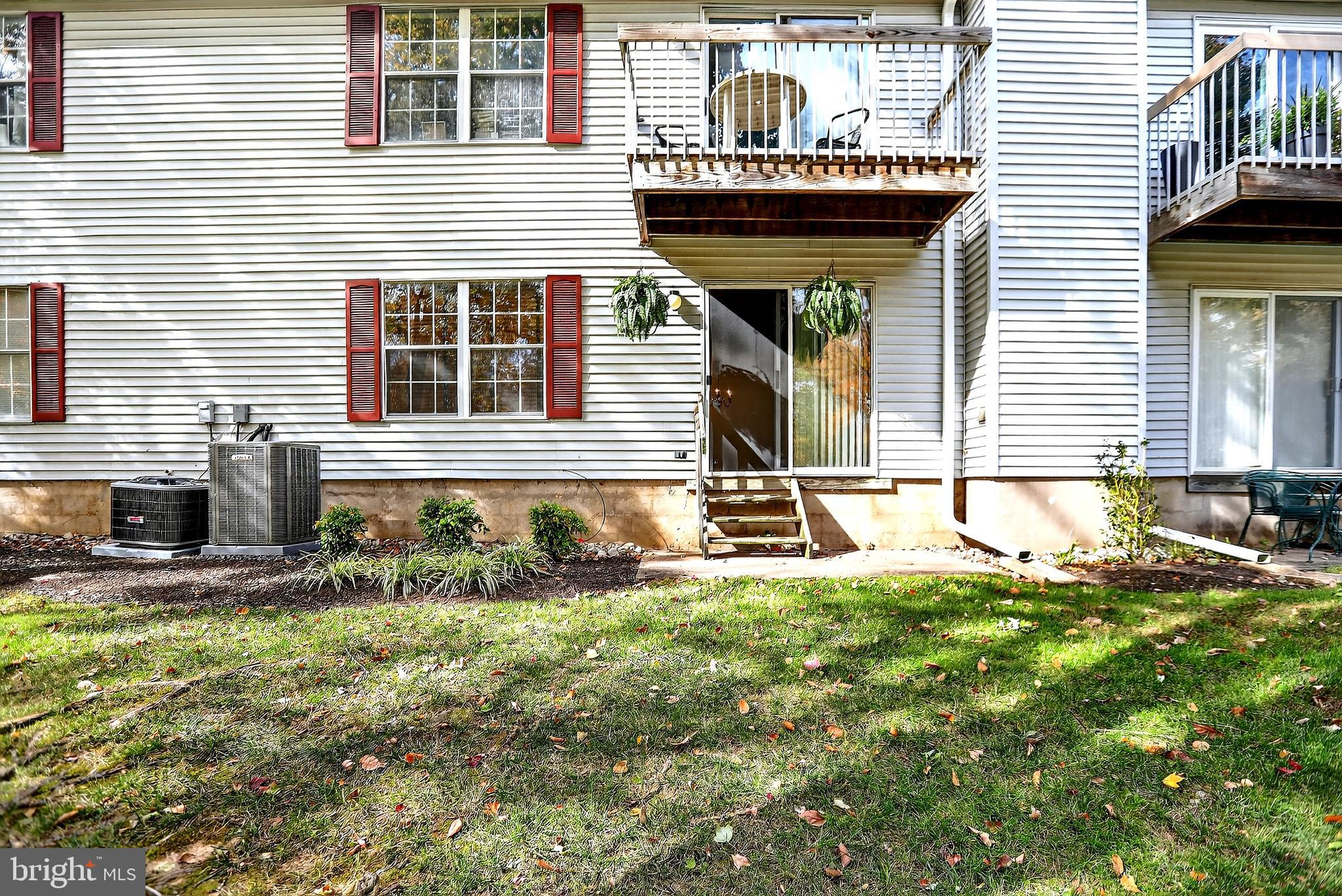 13 Azalea Court Lawrenceville, NJ 08648 - Photo 27 of 27 a front view of a house with garden