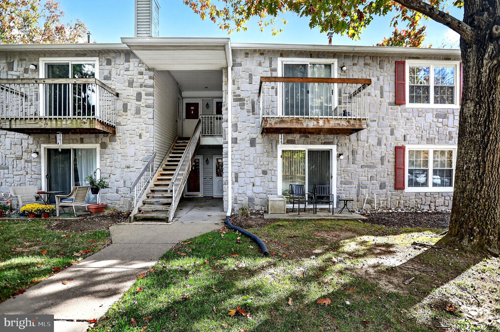 13 Azalea Court Lawrenceville, NJ 08648 - Photo 3 of 27 front view of a house with a yard
